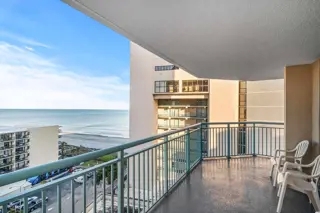 Uninterrupted Coastline Views from This Spacious 4-Bedroom Condo